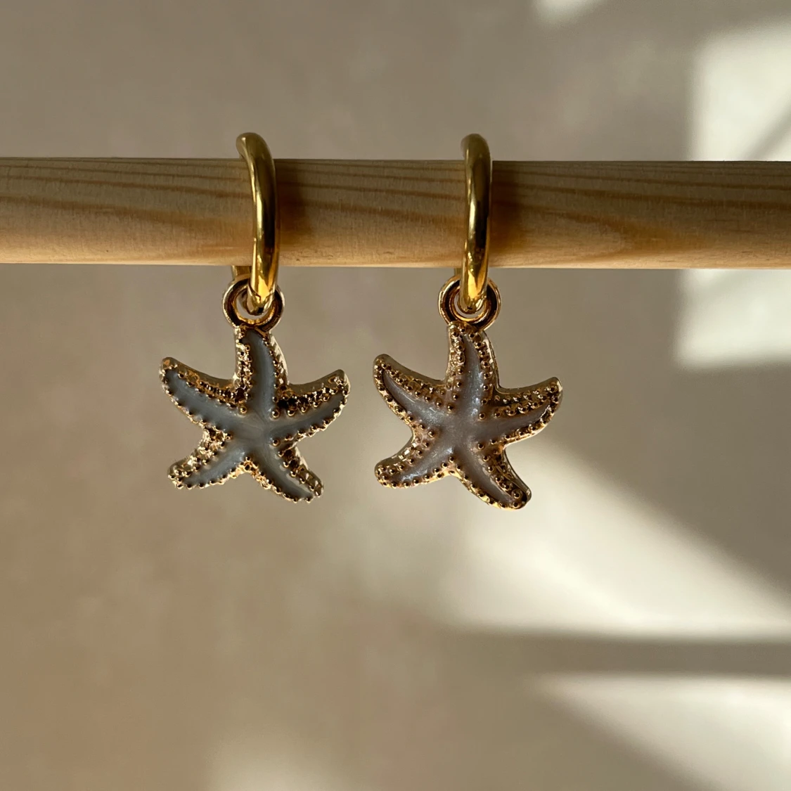 Guldörhängen med sjöstjärna - 91