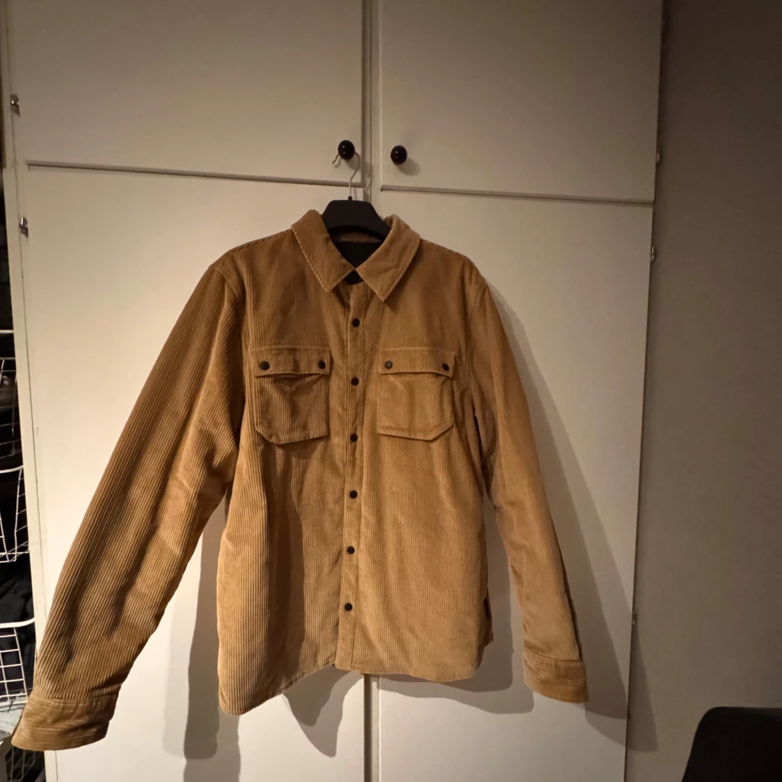 Beige manchesterjacka