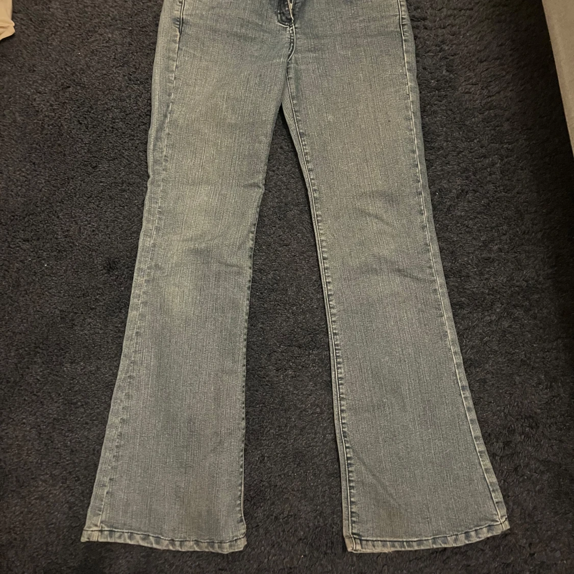 Grå jeans från Henri Lloyd