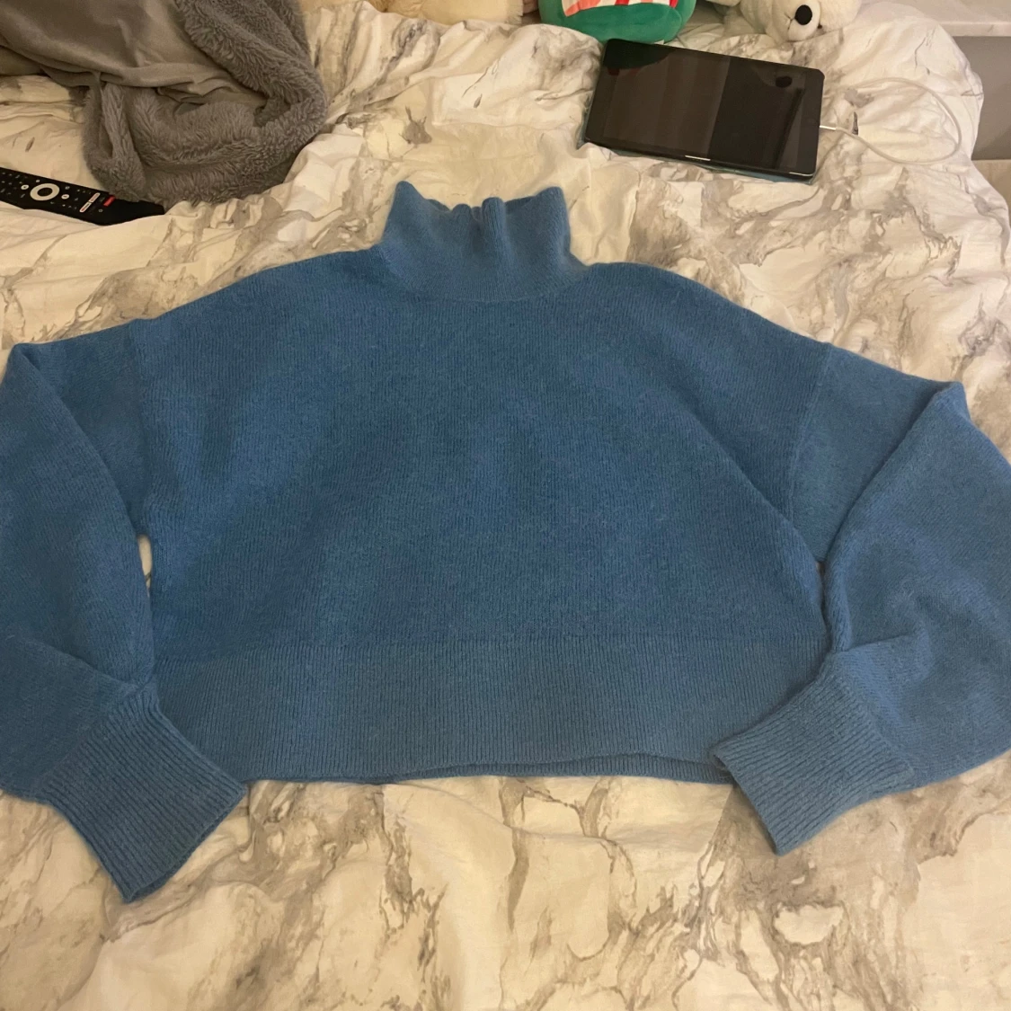 Blå stickad tröja