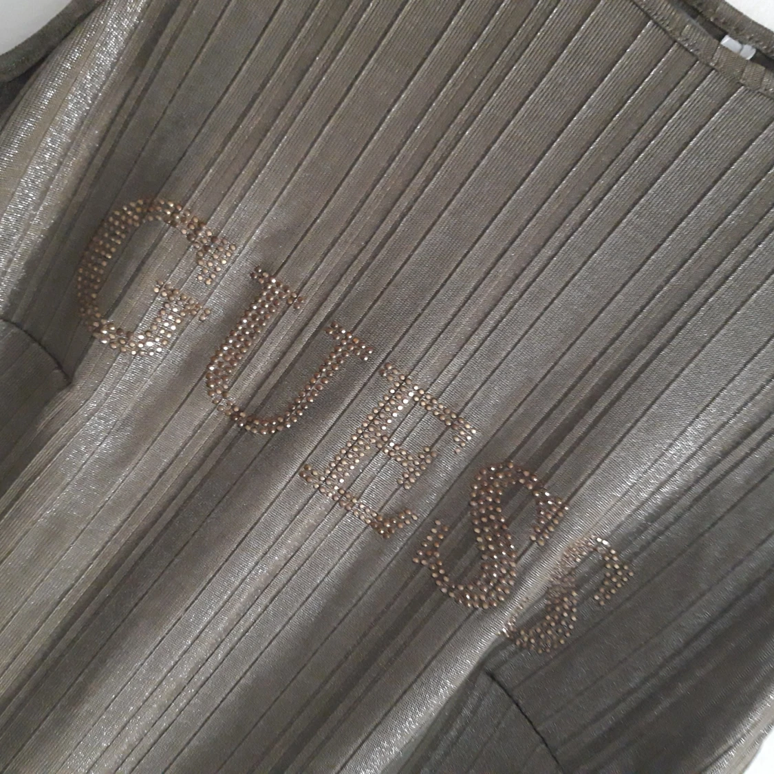 Glittrig topp från Guess - 91