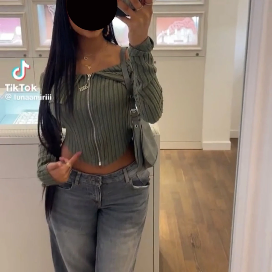 Olivgrön ribbad tröja med dragkedja