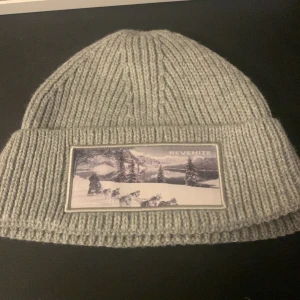 Revenite mössa - Oanvänd, perfekt skick. 