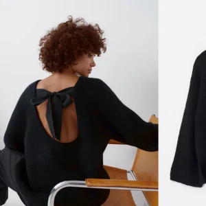 Svart tröja med öppen rygg och rosett - Snygg svart tröja med öppen rygg och en dekorativ rosett. Perfekt för en stilren look med en twist. Tröjan har långa ärmar och en lös passform.