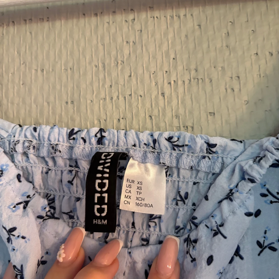 Blommig ljusblå klänning H&M Divided - 1