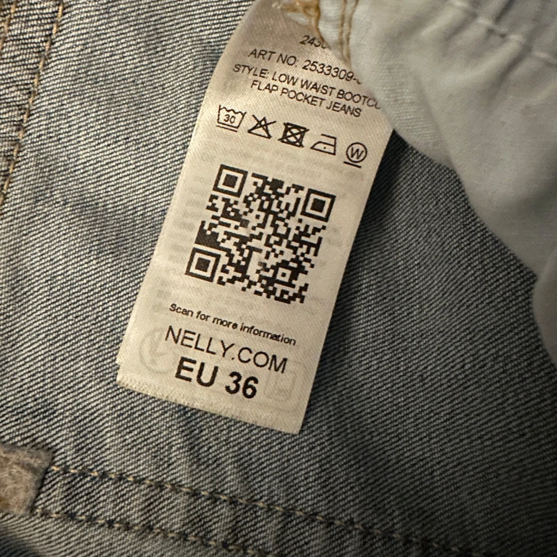 Bootcut jeans med slitna knän från Nelly - 3