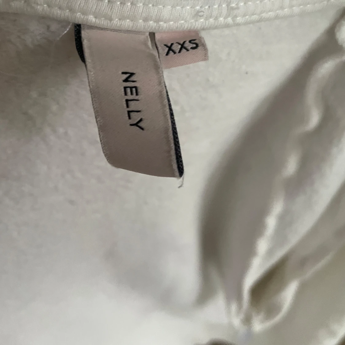 Vit zip hoodie från Nelly XXS - 2
