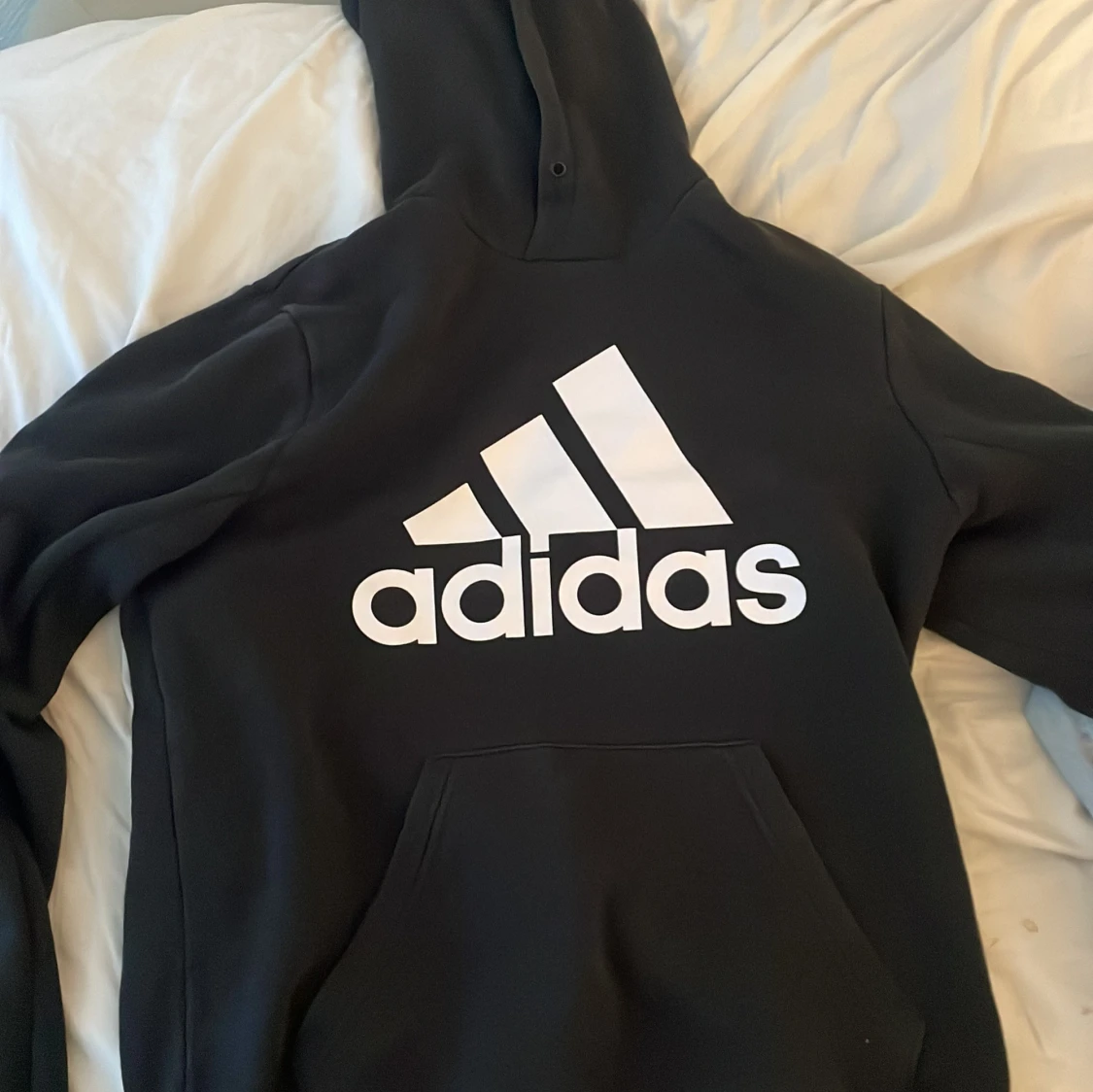 Svart hoodie från Adidas