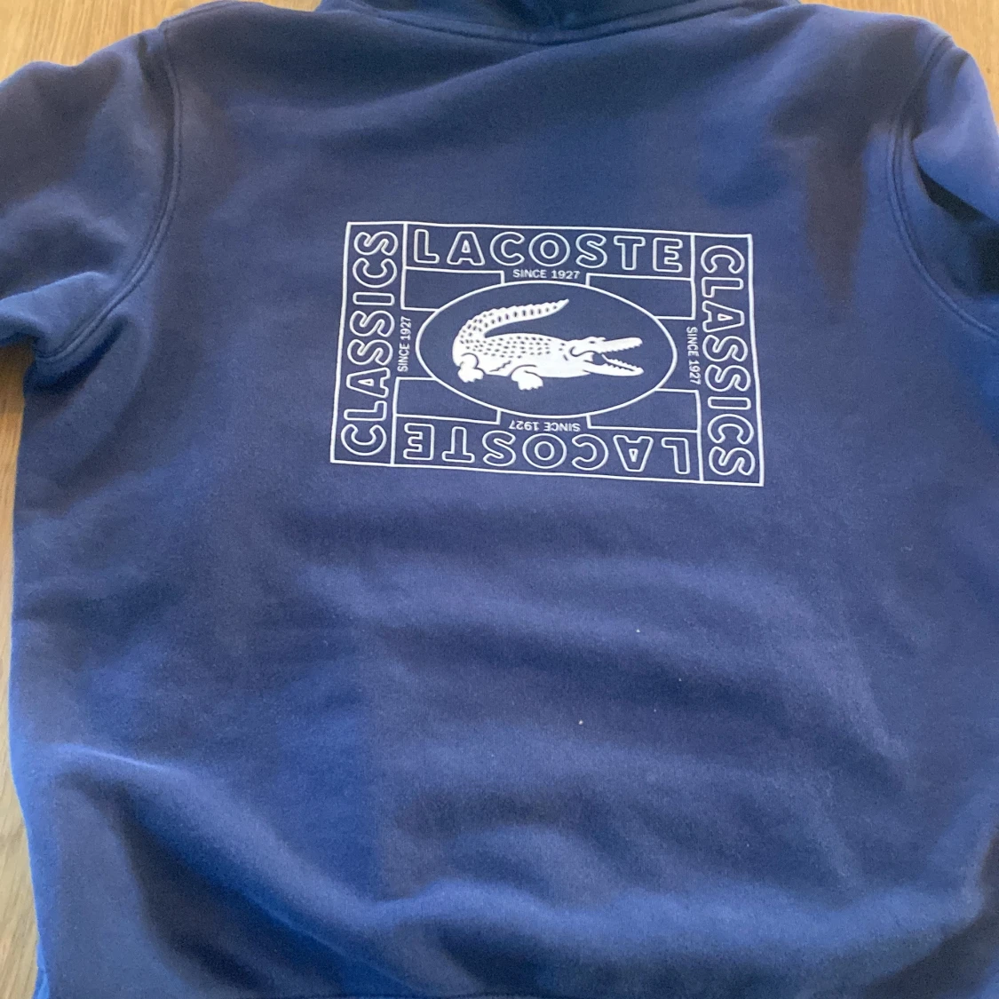 Blå hoodie från Lacoste - 1