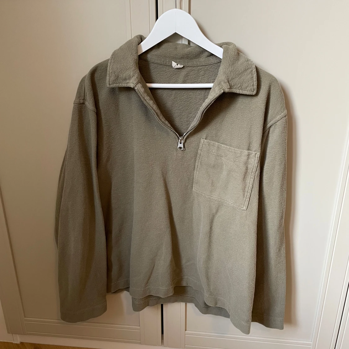 Grön tröja med dragkedja - 1