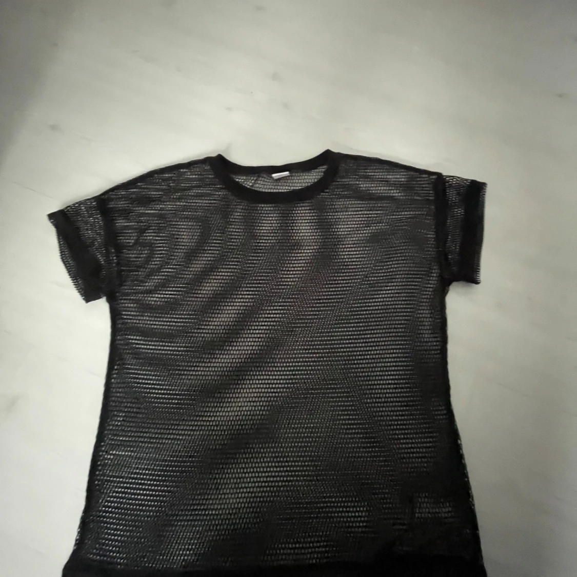 Svart meshtröja från Lindex