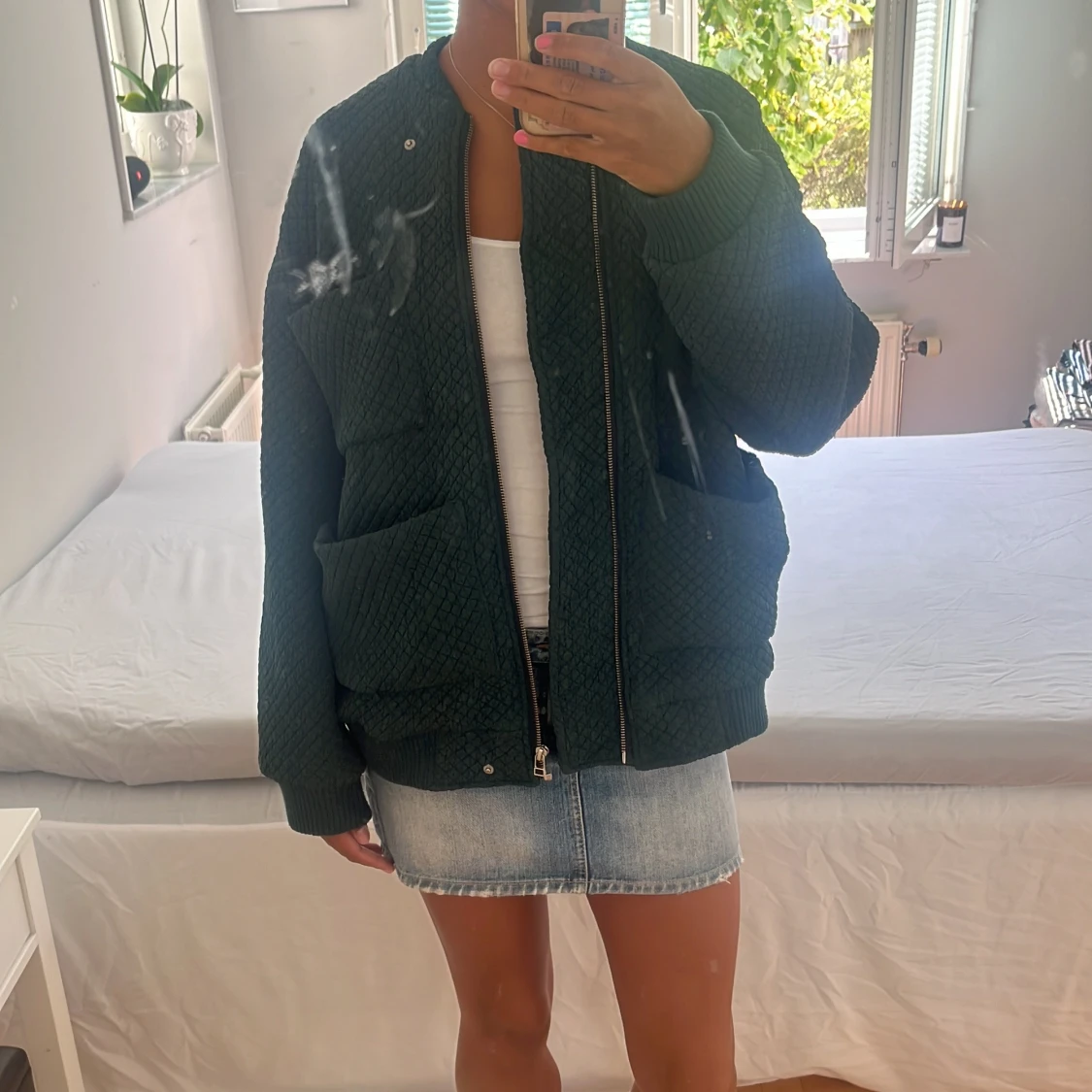 Mörkgrön quiltad bomberjacka