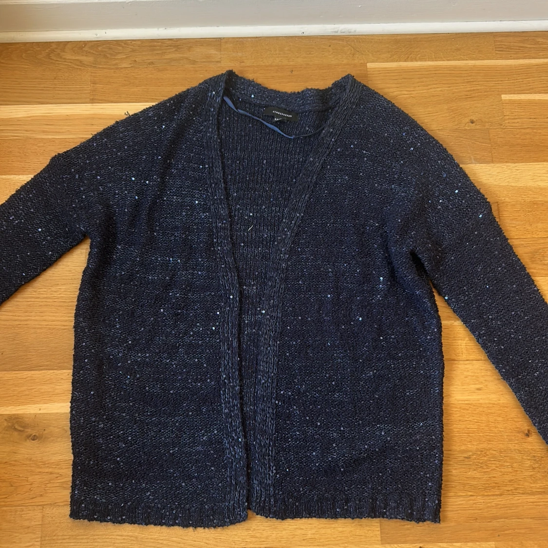 Mörkblå paljettkofta från Atmosphere