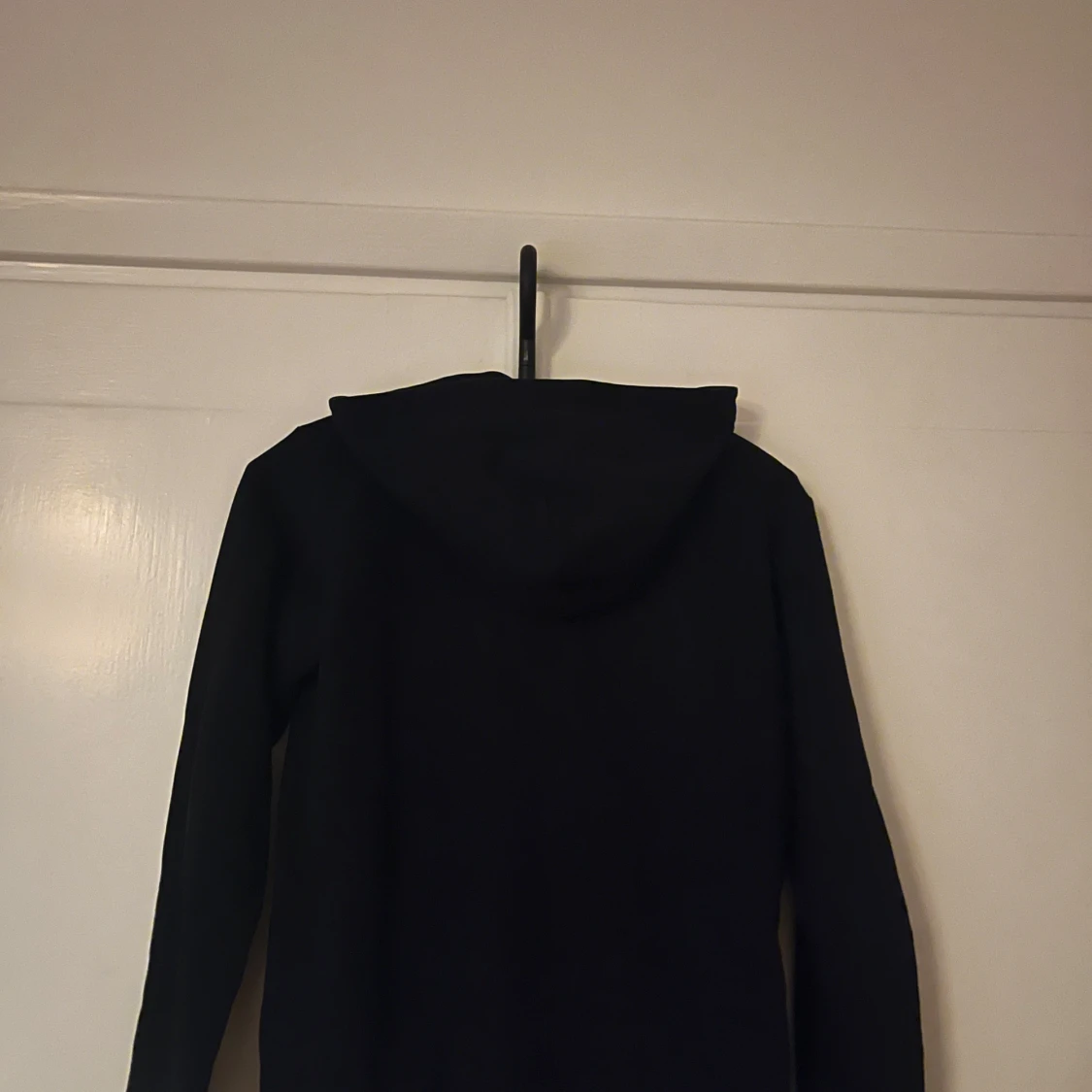 Svart hoodie från Peak Performance - 1