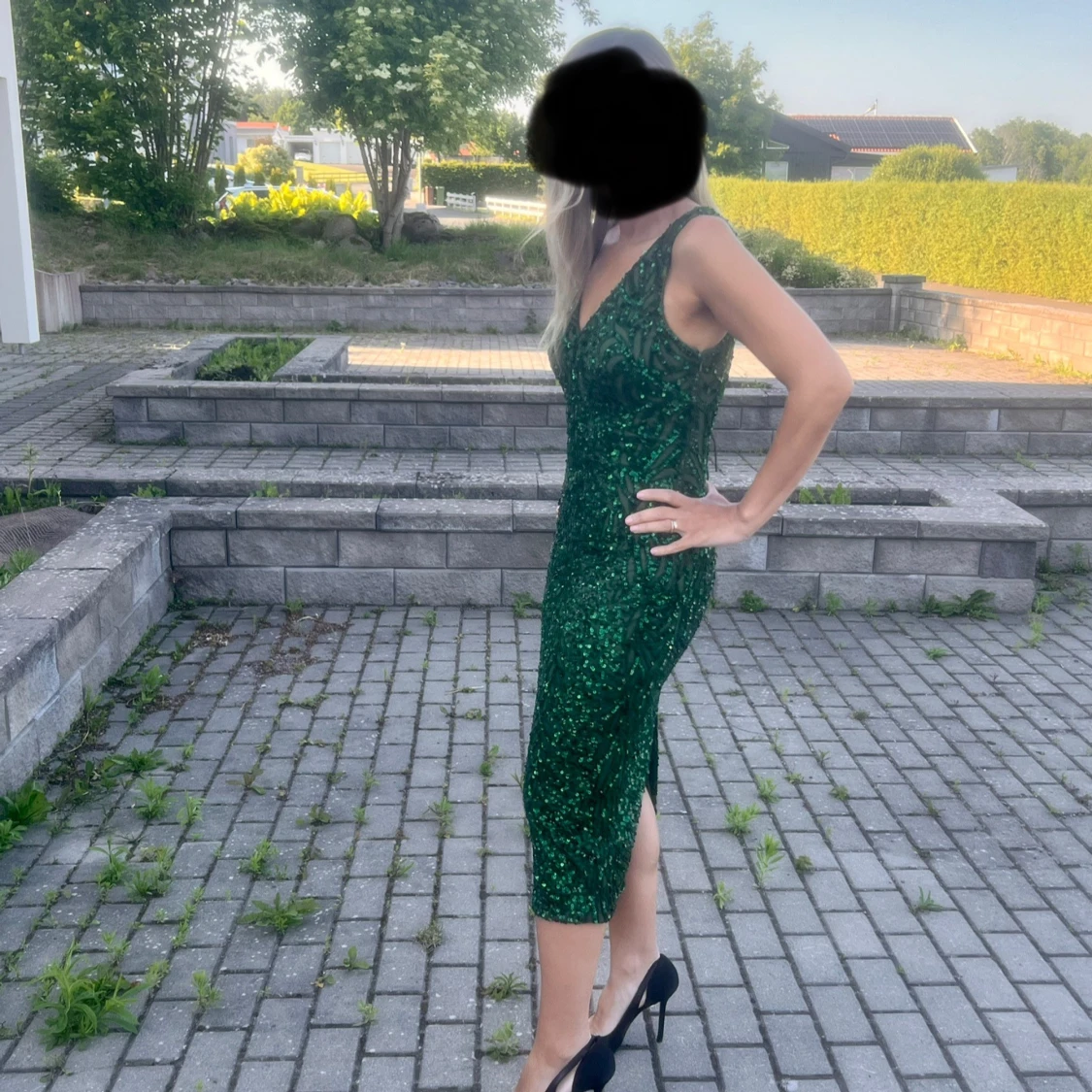 Grön glittrig klänning med snörning