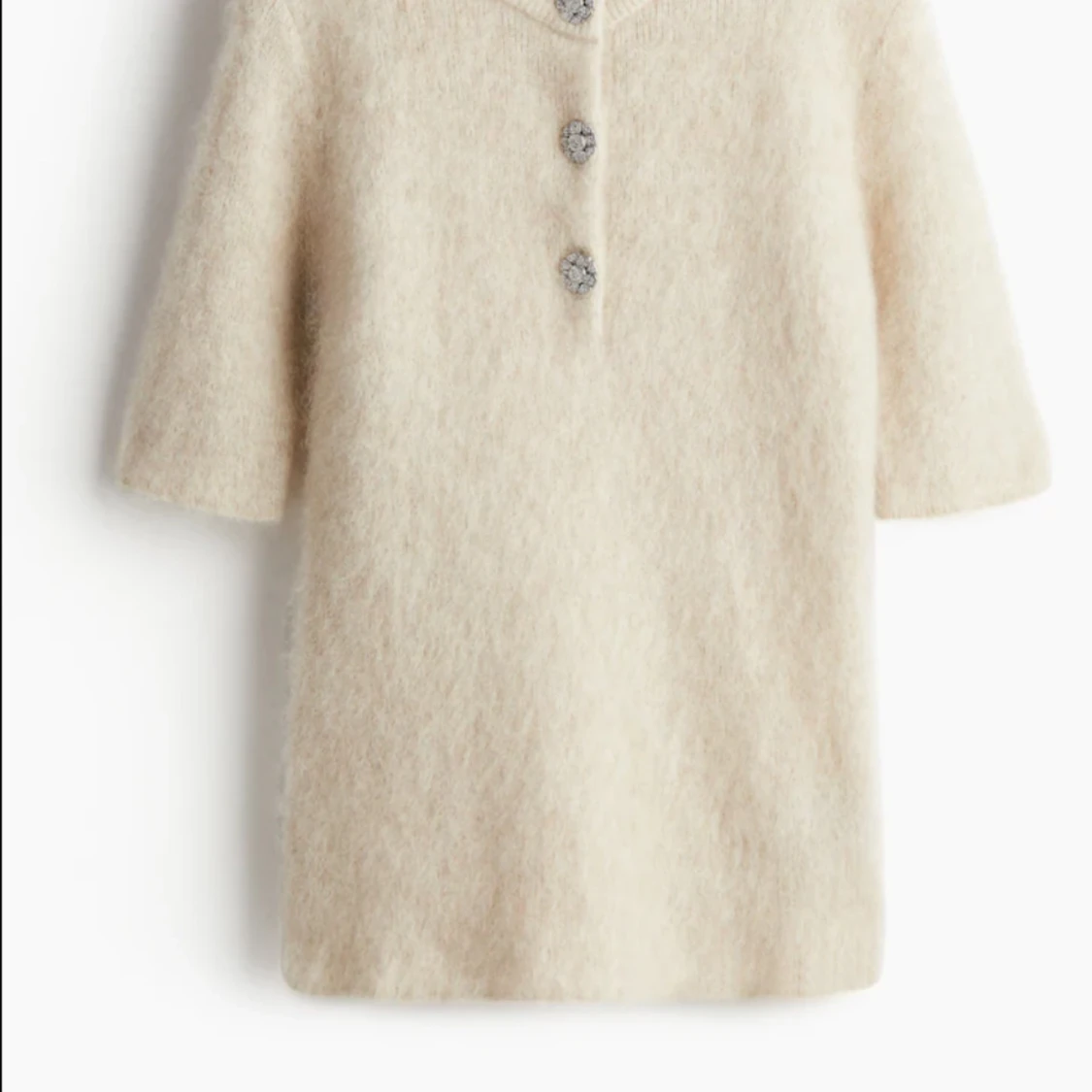 Beige stickad tröja med knappar