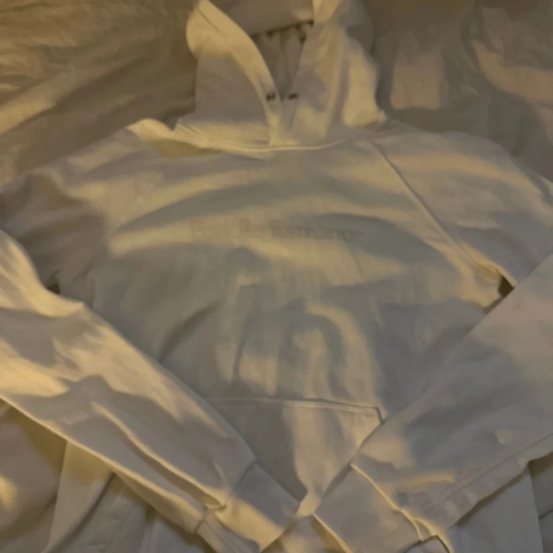 Vit hoodie från Peak Performance