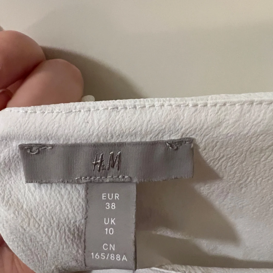 Vit volangprydd topp  från H&M - 1