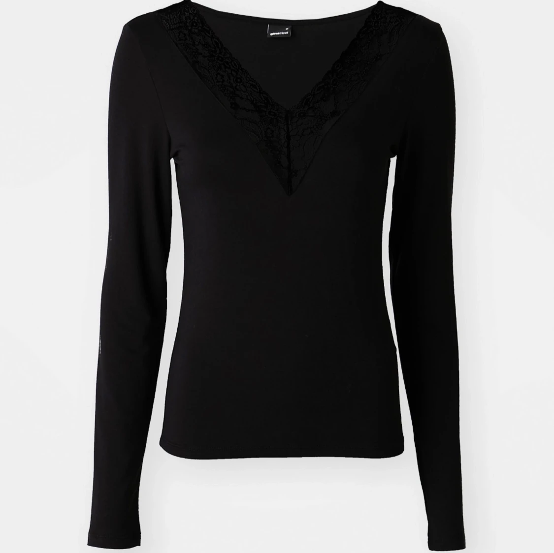 Svart långärmad topp med spetsdetaljer