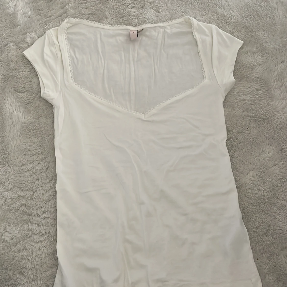 Vit kortärmad topp från Nelly