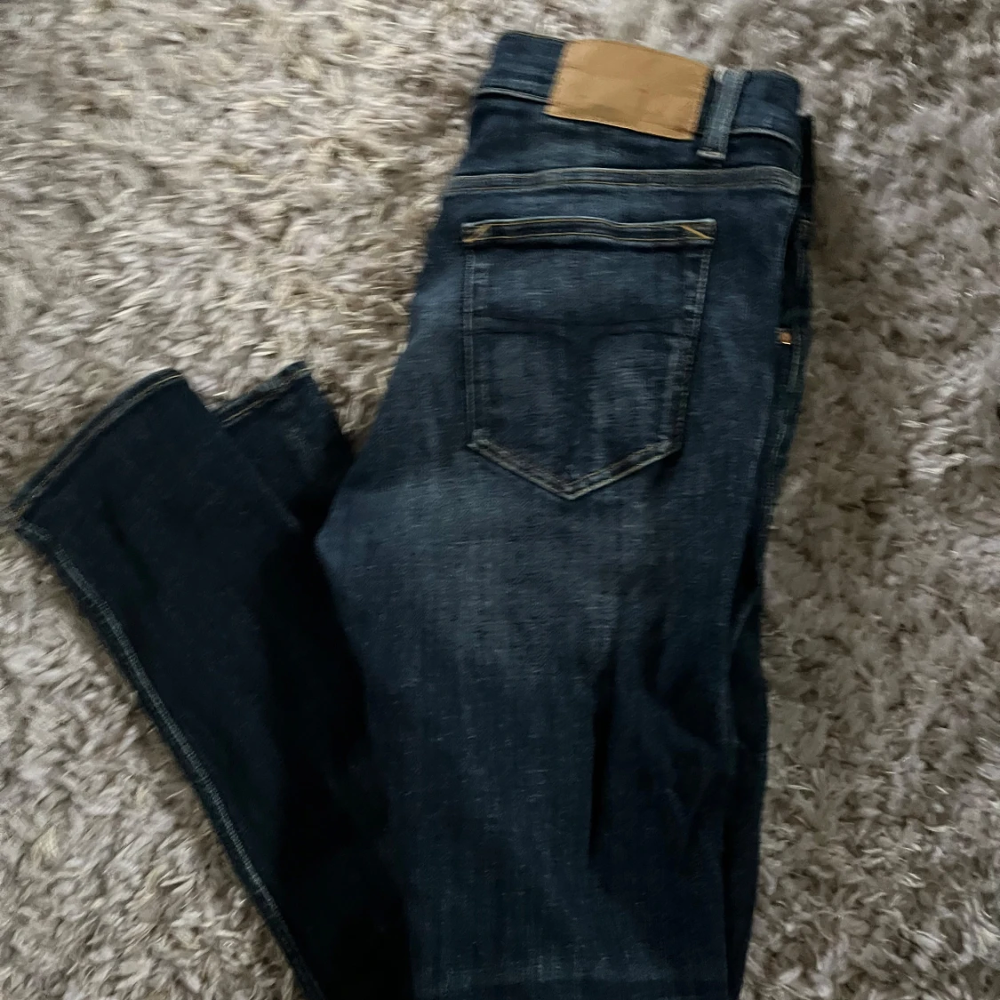 Mörkblå jeans från Tiger of Sweden