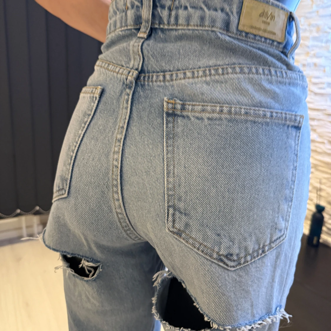 Blå högmidjade jeans