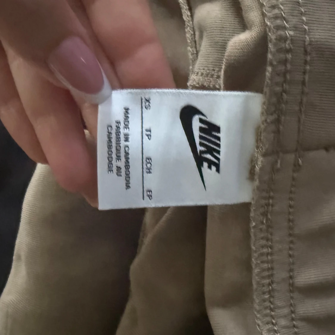 Nike mjukisbyxor beige och vita XS