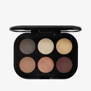 MAC Connect In Colour Eyeshadow Palette Nude Board - Snygg ögonskuggspalett från MAC med sex olika nyanser. Paletten innehåller både skimrande och matta färger i guld, brons och bruna toner. Perfekt för att skapa både vardagliga och festliga looks. Endast testad. Nypris: 550kr
