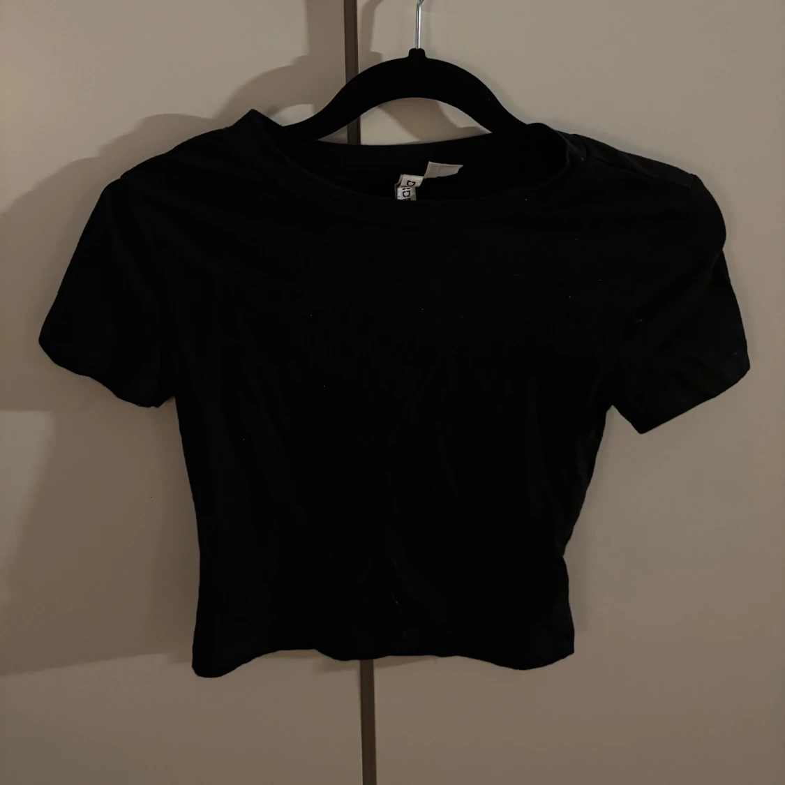 Svart croppad topp från H&M Basic