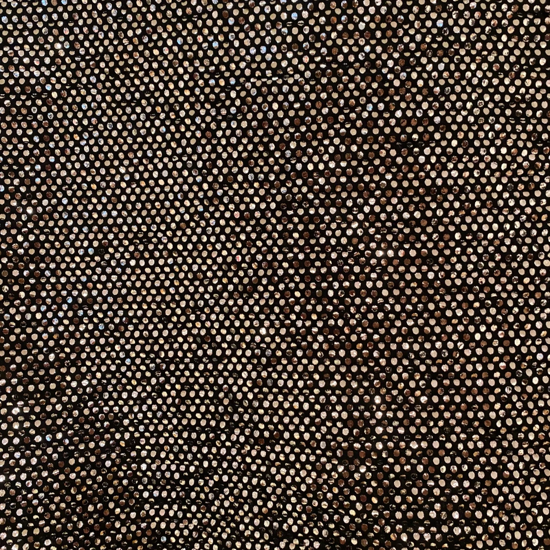 Glittrig svart minikjol - 1