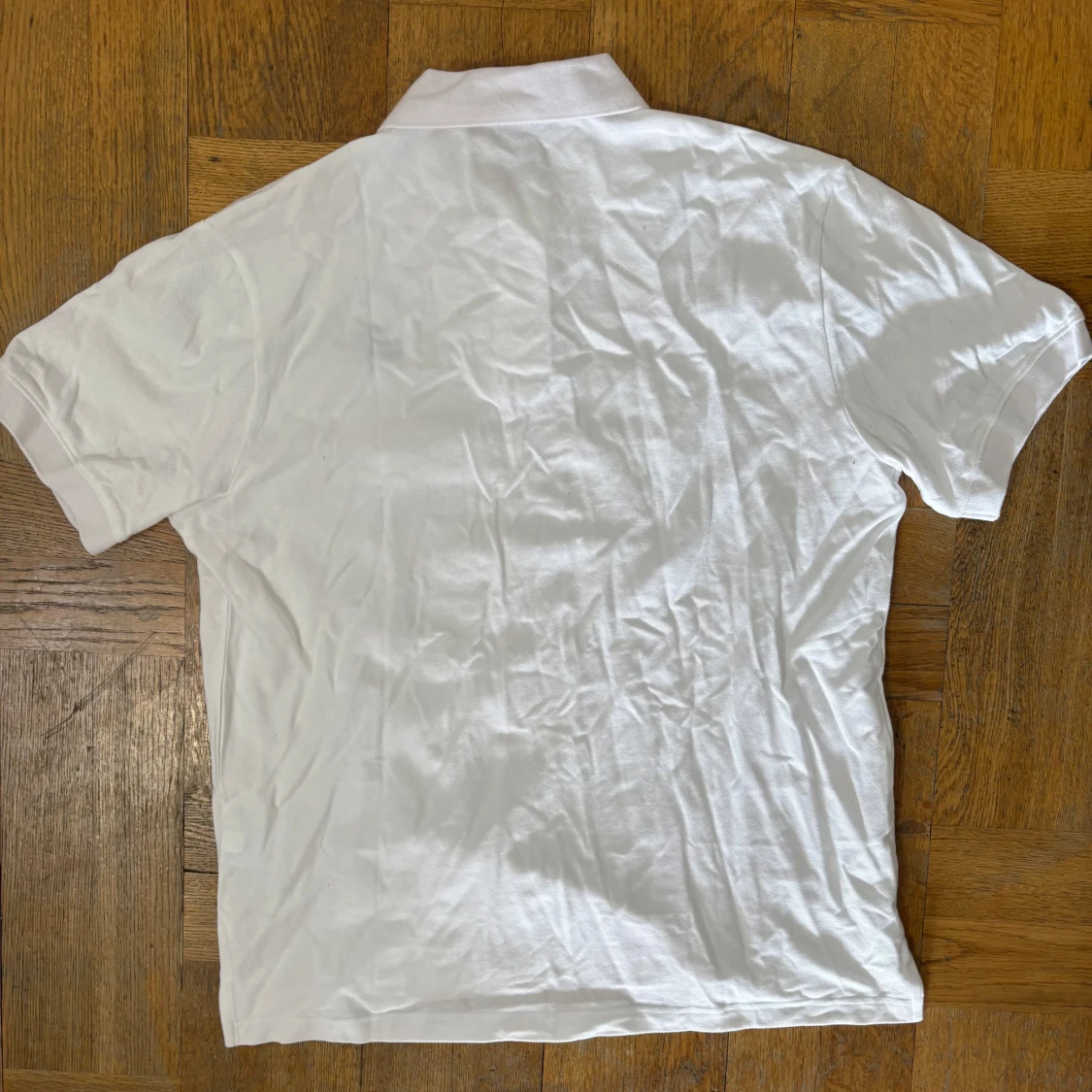 Vit pikétröja från Nike - 1