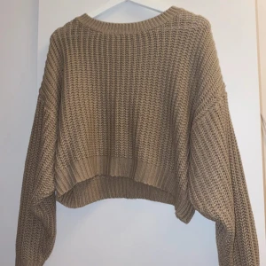 Stickad långärmad  - Använd 1 gång 