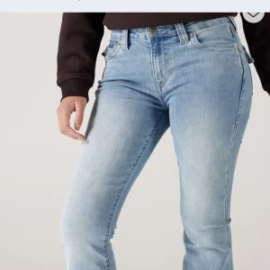 Ljusblå  jeans True Religion -  jeans från True Religion,mid waist jeans,som nya