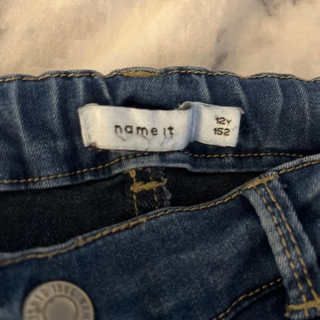  Mörkblå bootcut jeans från Name It storlek.152 - 2
