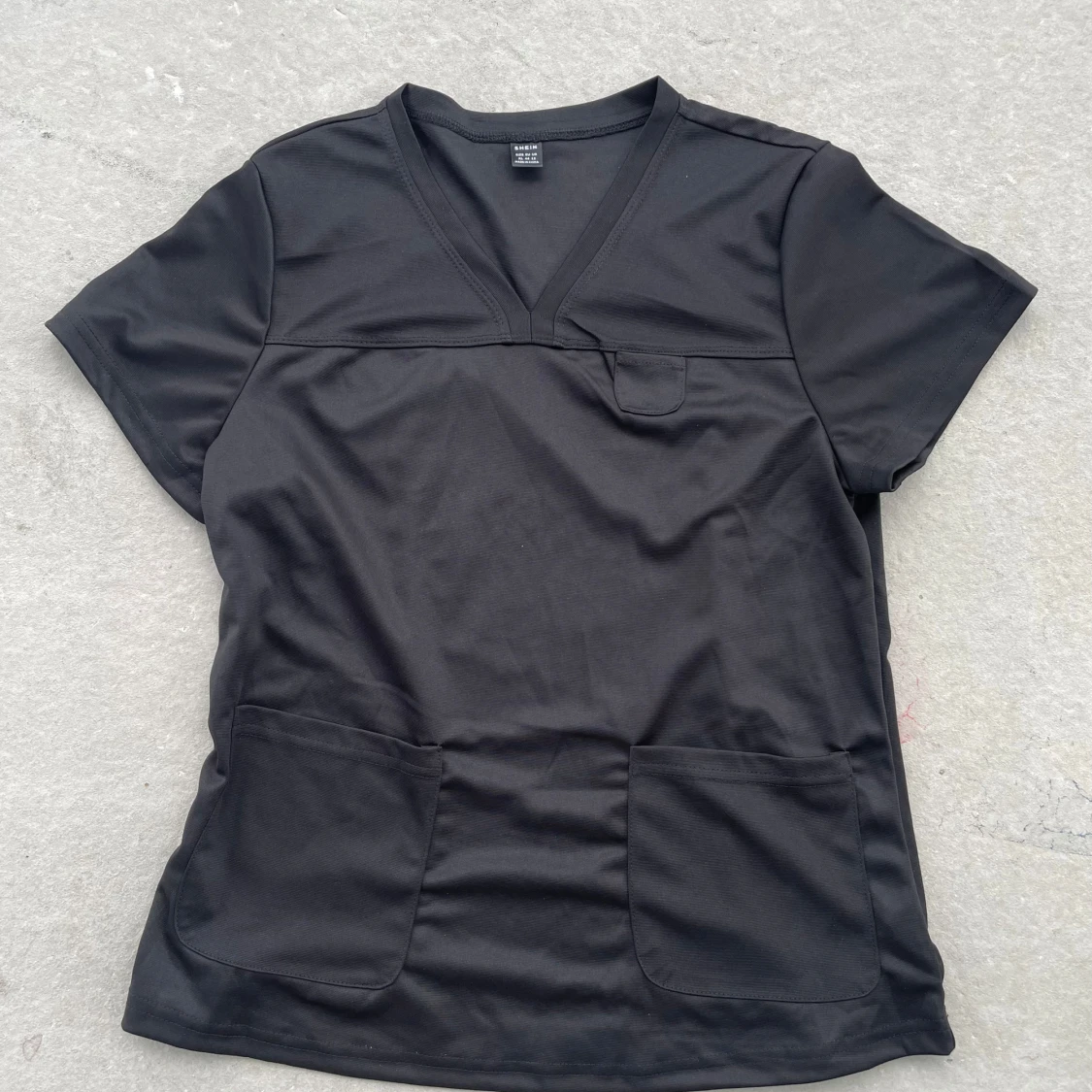 Svart Shein topp med fickor