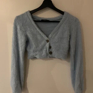 Ljus blå kofta  - Ljus blå kofta i bra skick från Berskha 