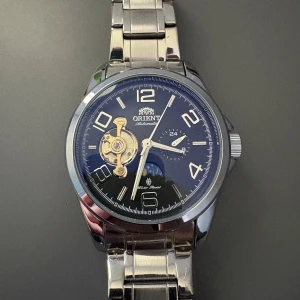 Orient automatisk moonphase - Mycket bra skick, inget kvitto eller låda därav bra pris. 