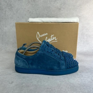 Christian Louboutin junior spike sneaker - – Condition: 9/10  - What is included: Dustbag  – Retail price: 9000 + SEK
