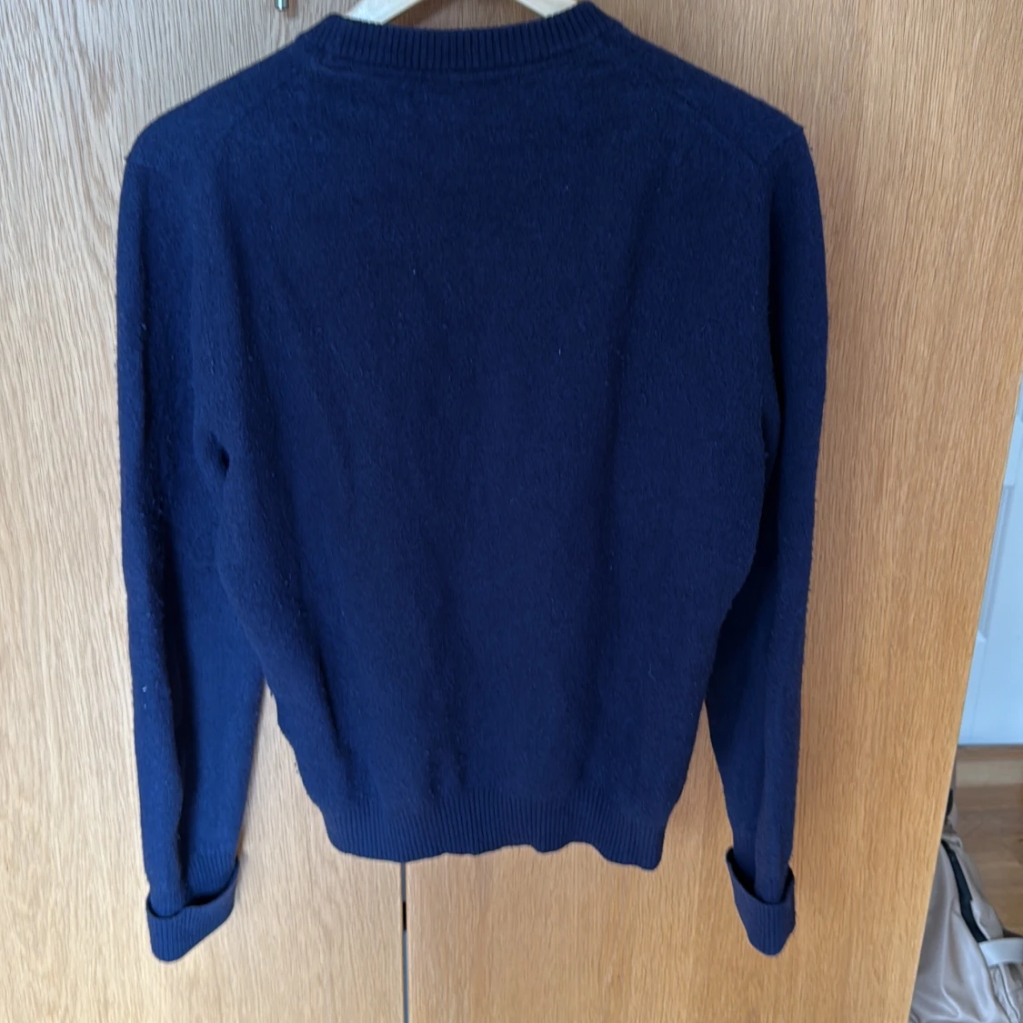Mörkblå stickad tröja från Stenströms S-M - 1