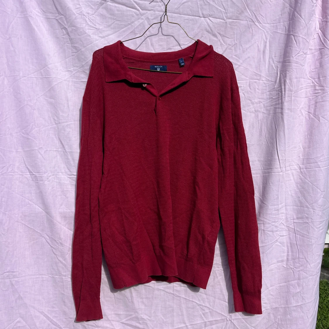 Röd pikétröja från GANT i kashmirmix