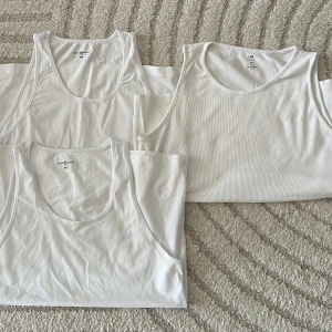 Linnen - Linnen i nytt skick. Två vanliga och ett ribbat. Två är i storlek XL och ett i storlek L.