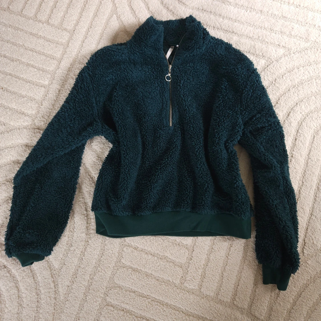 Mörkgrön fleece-tröja med halv dragkedja