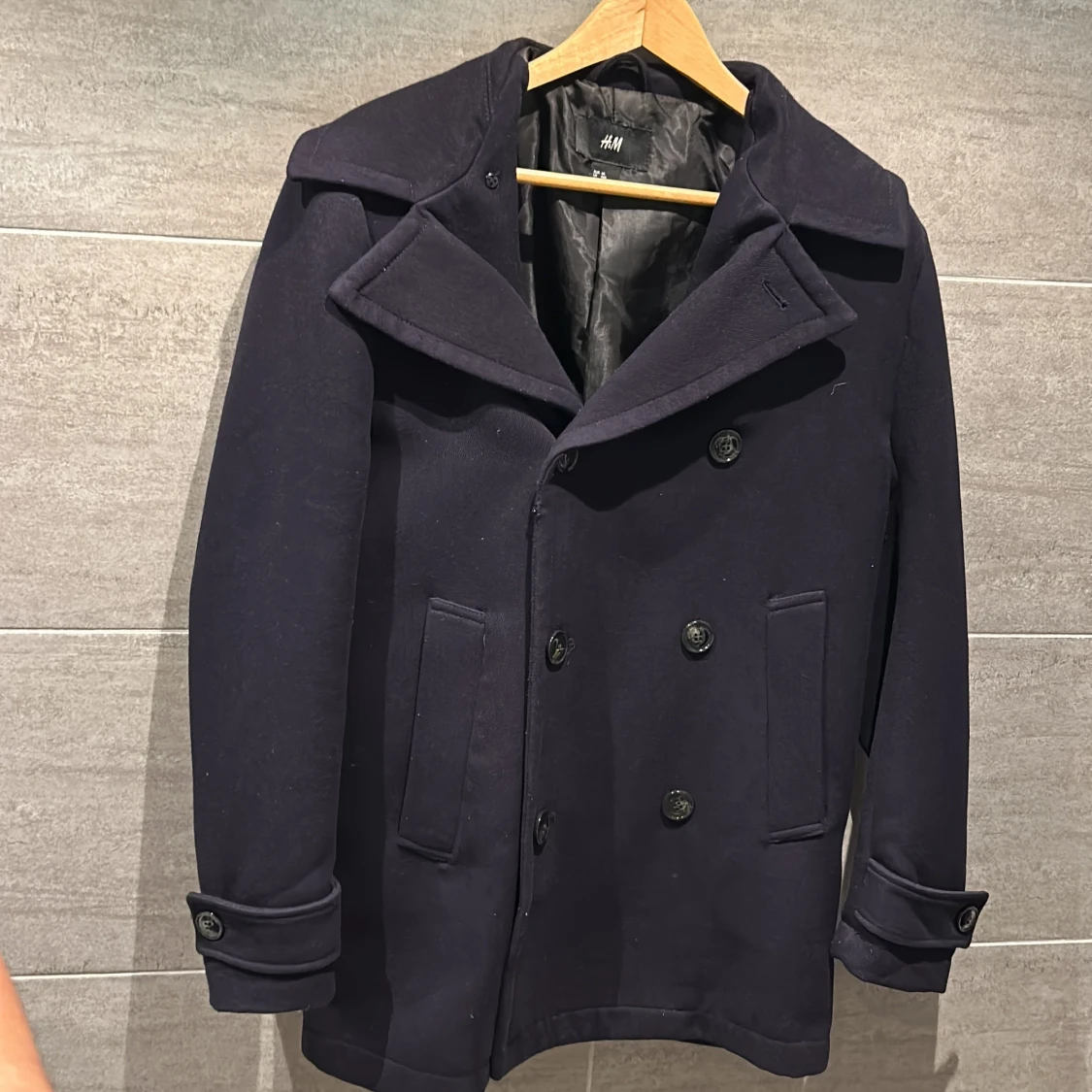 Mörkblå skepparkavaj från H&M