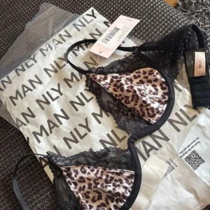Leopardmönstrad spets BH från NLY - Säljer en leopardmönstrad BH från NLY.