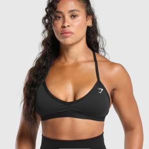 Svart sportbh från Gymshark - Snygg svart sportbhfrån Gymshark med smala axelband. Nästintill oanvänd 