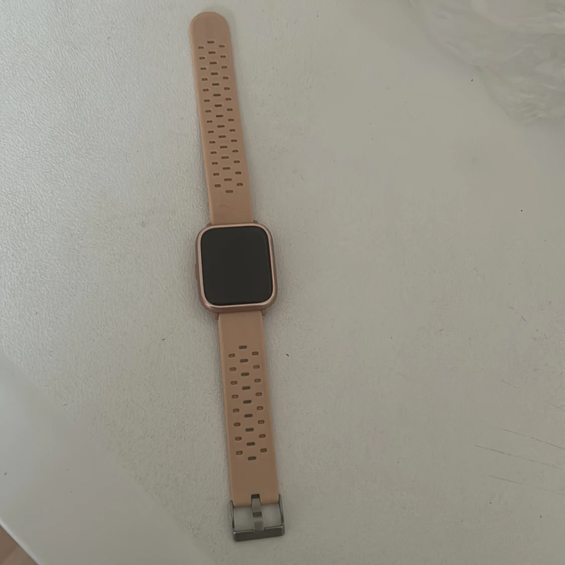 Smartklocka med beige/ljus rosa silikonarmband - 1