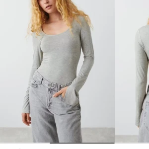 Grå långärmad topp från Gina Tricot - Säljer en enkel och stilren grå långärmad topp från Gina Tricot. Toppen har rundad urringning och är tillverkad i mjuk bomullsmix, perfekt att matcha med jeans eller kjol 🫶🏻