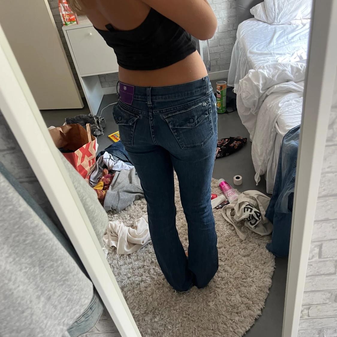 Blå bootcut jeans med fickdetaljer från Victoria Beckham  - 1