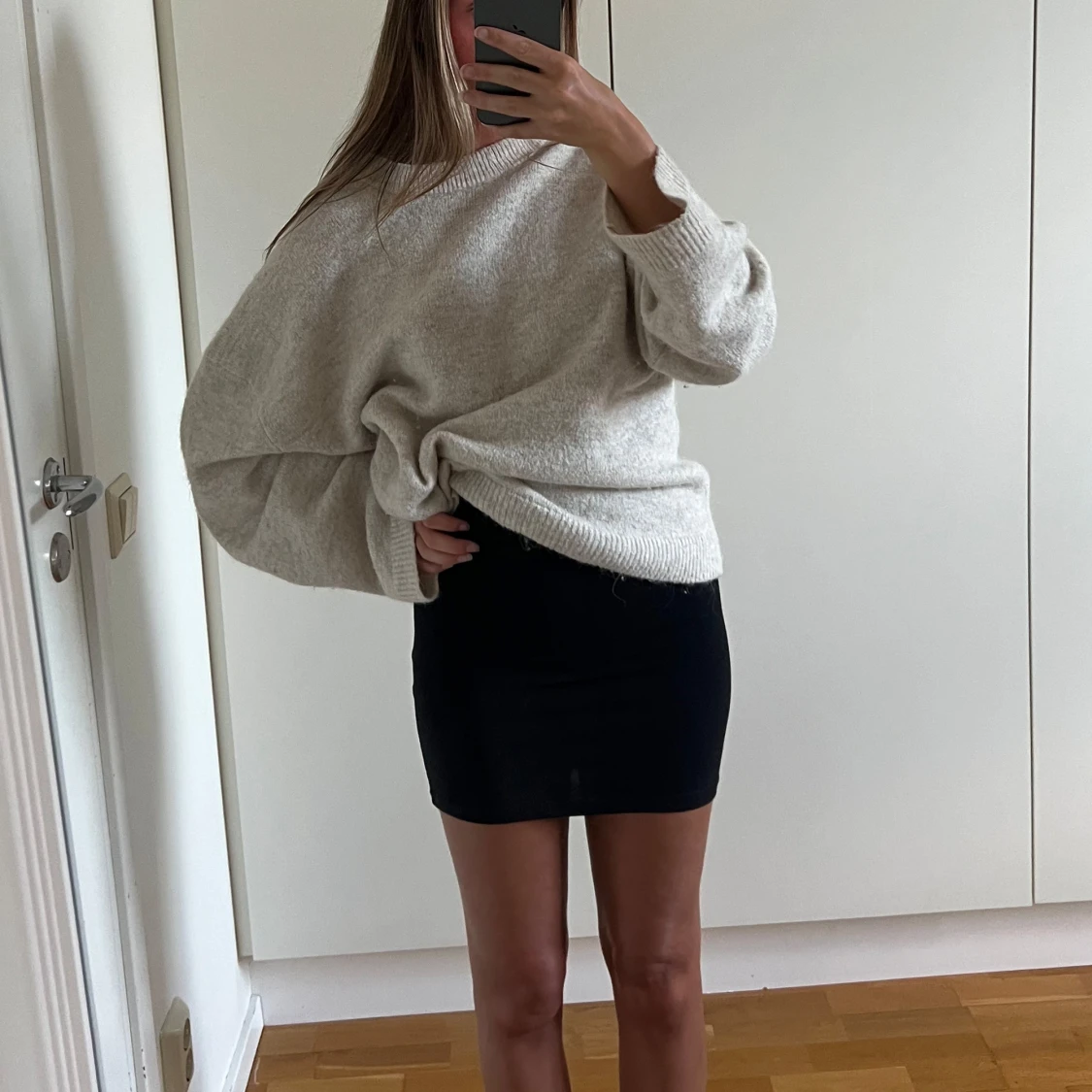 Svart stickad minikjol - 1