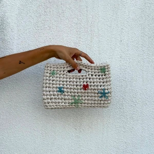 Crochet Clutch with Embroidery 🌸 - The Isabel bag is made with upcycled t-shirt fabric yarn and hand-embroidered. Inspired by my Grandmother’s beautiful garden 🌸 It holds all daily necessities; phone, wallet, keys and lipstick 🧚🏼  Handmade, with love, in Portugal 🌞If you have any questions or doubts, don’t hesitate to reach out)